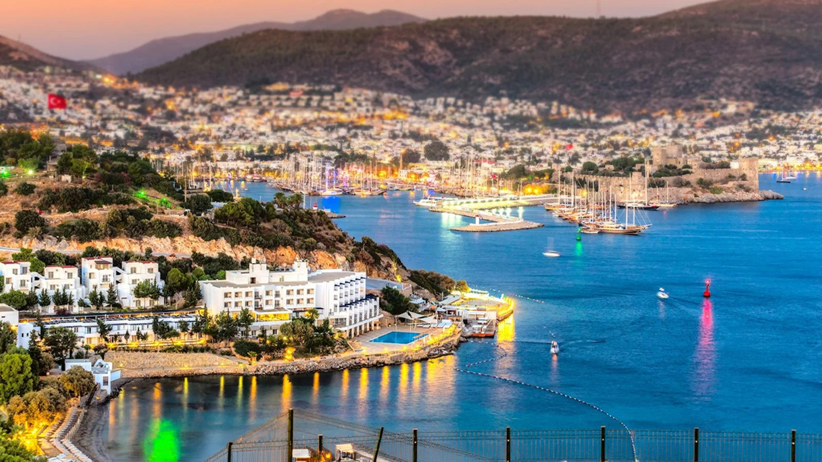 Aerial view of luxury branded residence concentration on Bodrum peninsula at sunset